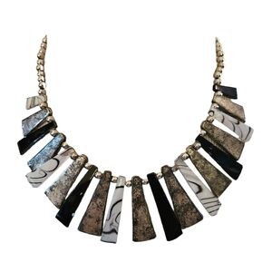 Black and white enameled abstract collar necklace.